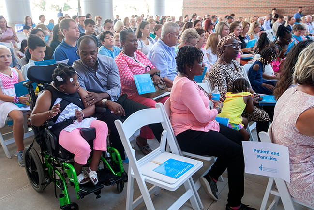 Patients and families at the dedication