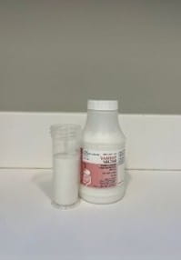 Mildly thick liquid (nectar) barium in a bottle.