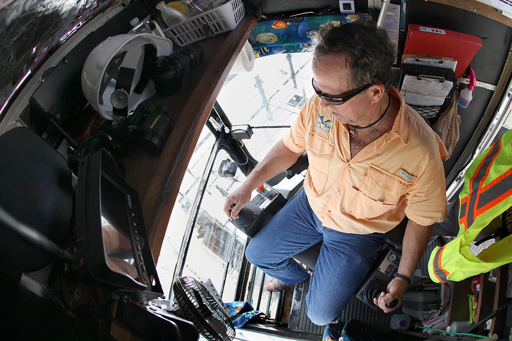 Crane operator inside the crane