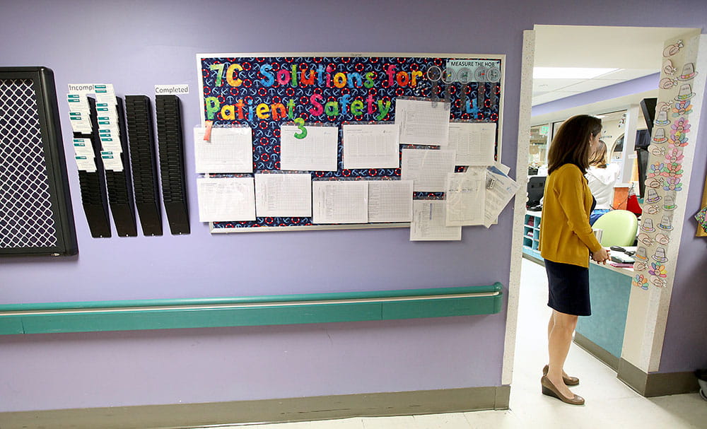 Elizabeth Mack in hallway