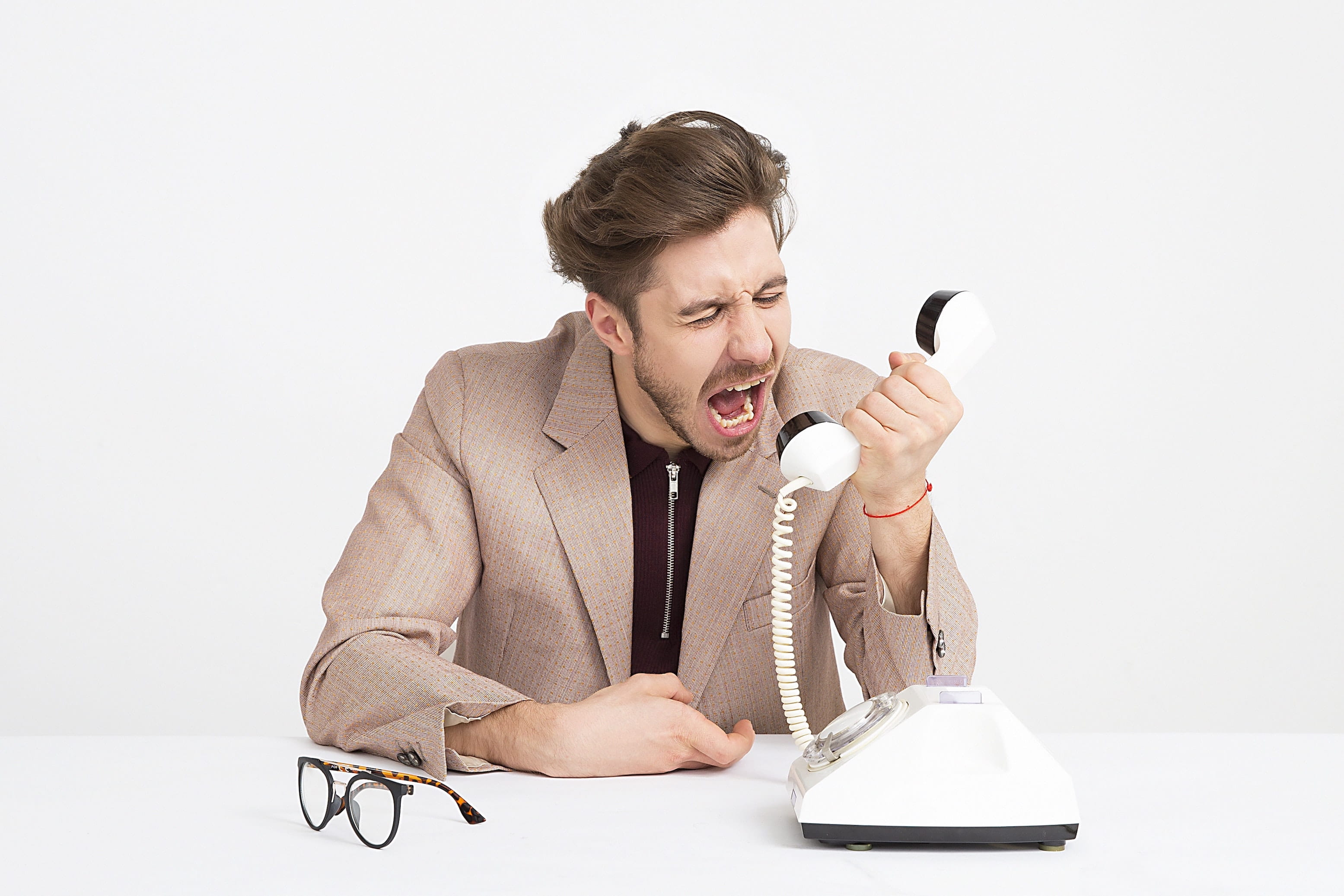 man yelling at phone