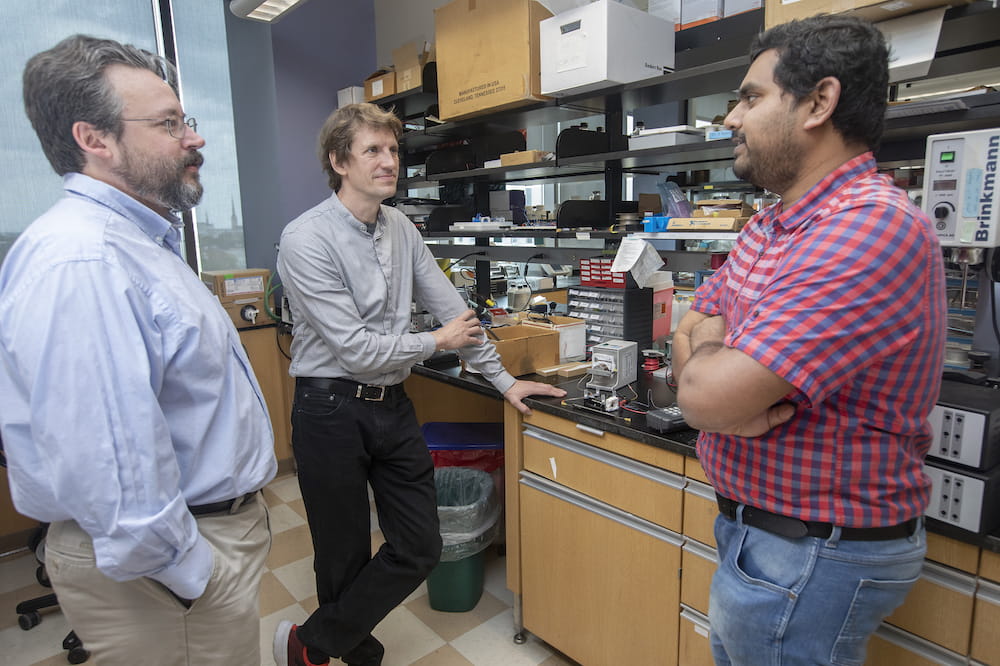 From left to right, Yuri Peterson, Ph.D., Dieter Haemmerich, Ph.D., D.Sc.and Krishna Ramajayam, Ph.D., are members of the research term who developed the chemotherapy filtration device. Phorograph by Sarah Pack.