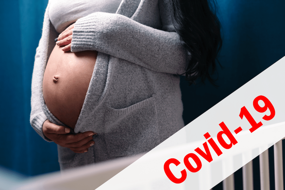 Pregnant woman holding her stomach with wording "COVID-19."