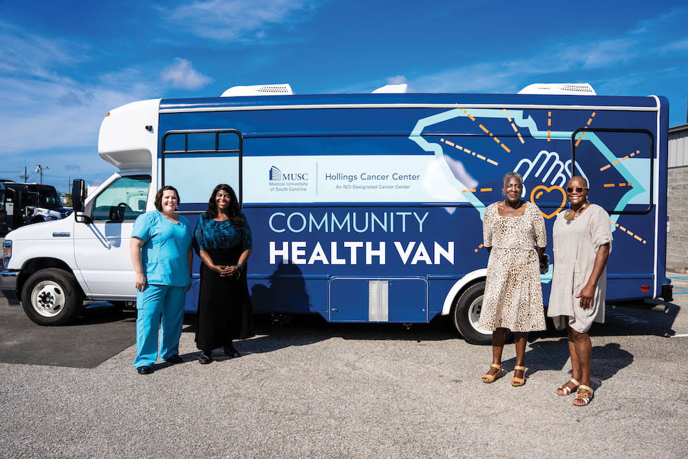 Dr. Ford and others standing in front of the MUSC Hollings community health van