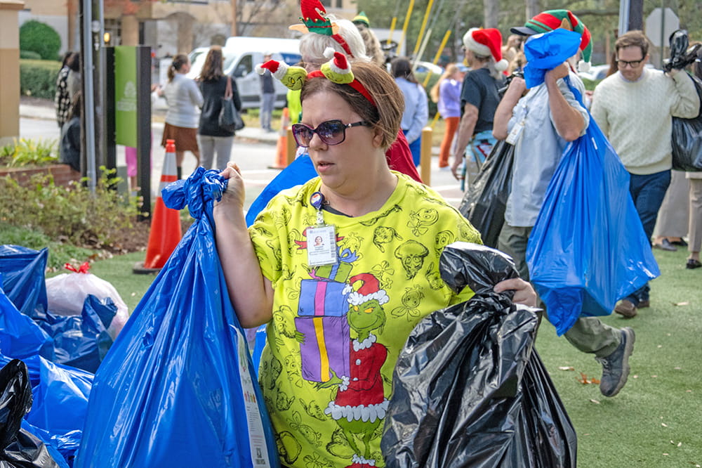 MUSC employees came out in droves at the Dec. 10 MUSC Angel Tree Parade to unload gift bags and items.