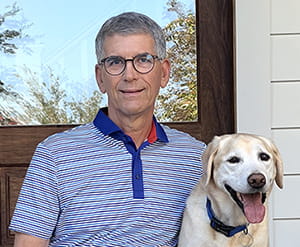 MUSC Health volunteers Alan Koblin and Poppy.